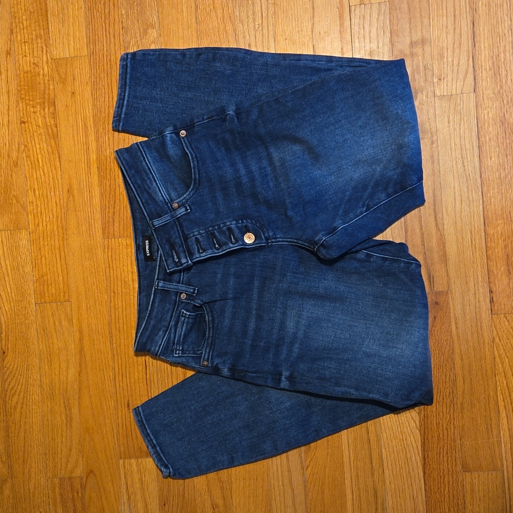 Express button fly super skinny women's blue jeans. Size 6 Curvy